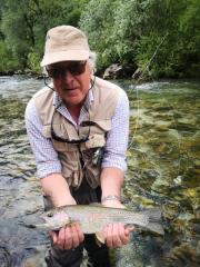Chris and rainbow trout, May Slovenia id